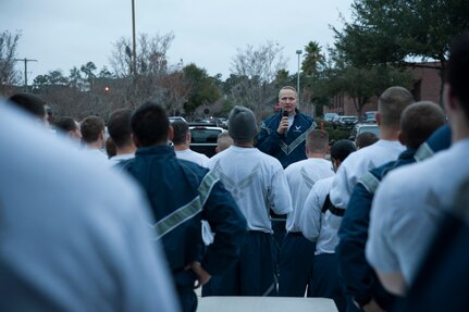 Col. Darren Hartford, 437th Airlift Wing commander, speaks to Airmen after the Commander's Run Dec.7, 2012, at Joint Base Charleston - Air Base. The Commander's Challenge is held monthly to test Team Charleston's fitness abilities. (U.S. Air Force photo/Airman 1st Class Ashlee Galloway)