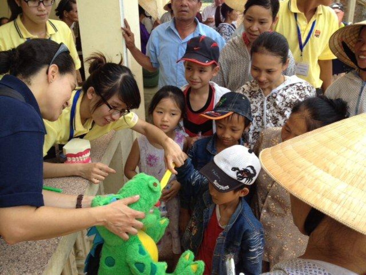 Children living in Southeast Asia are educated about oral hygiene during a humanitarian mission. Medical professionals from the Air Force, Army and Navy as well as members from U.S. Public Health Service and nongovernmental organizations visited remote regions of Southeast Asia to treat tooth decay and inform the public about preventive dental practices for healthier oral hygiene. (Courtesy photo)