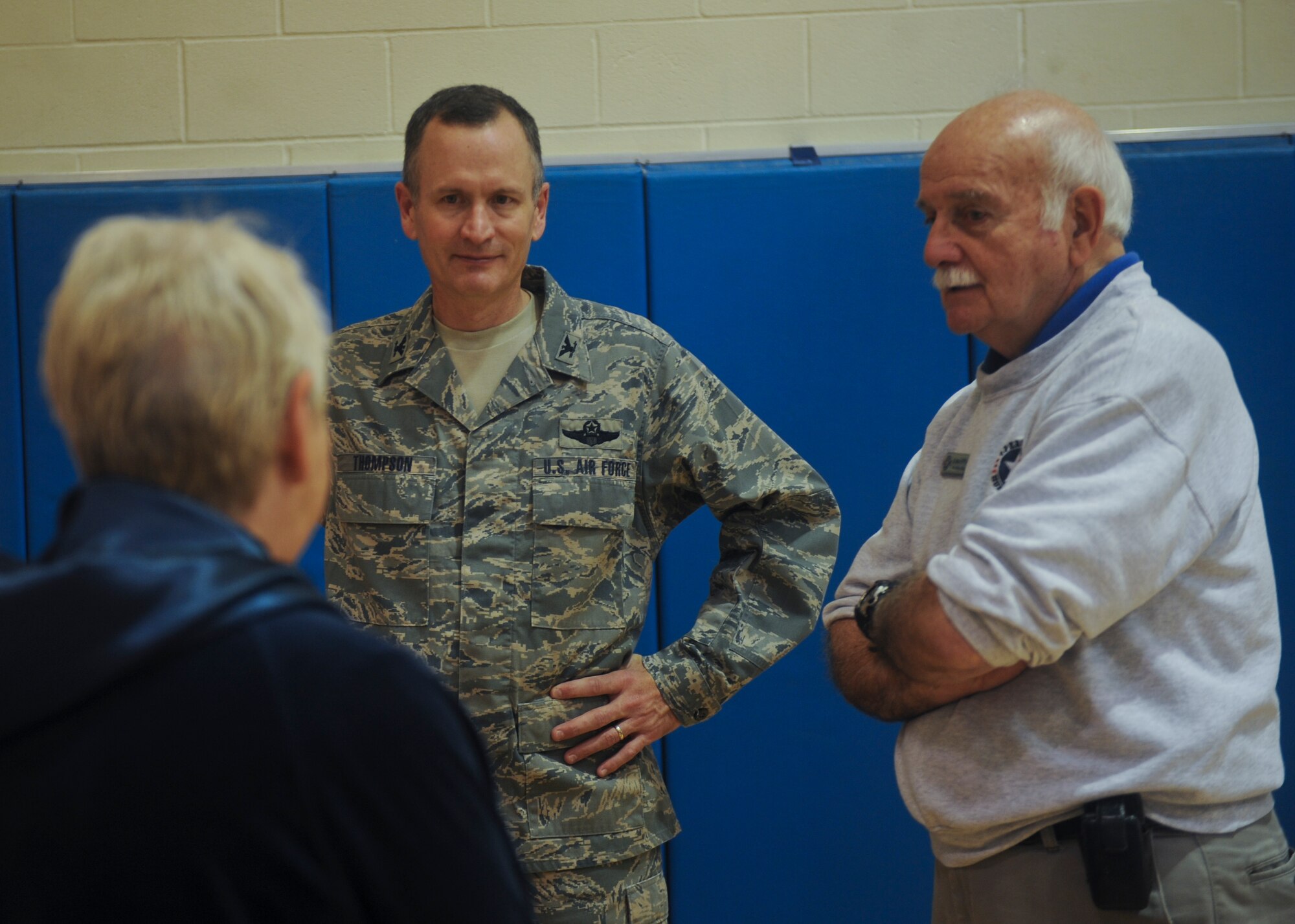 U.S. Air Force Col. Billy Thompson, 23d Wing commander, speaks to Leenie Ruben and Mike Patellis, Operation Homefront board of directors members, at Moody Air Force Base, Ga., Dec. 8, 2012. Operation Homefront is a program that provides emergency financial and other assistance to military members. (U.S. Air Force photo by Airman 1st Class Olivia Bumpers/Released)