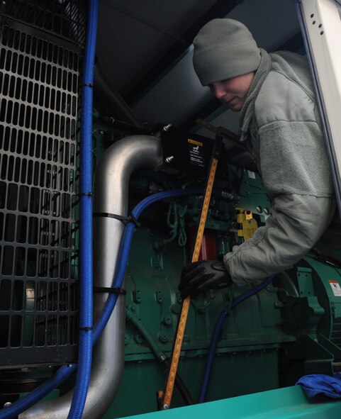Airman Thomas Neubert, 2nd Civil Engineer Squadron power production journeyman, conducts a pre-operational check on a generator on Barksdale Air Force Base, La., Dec. 11. The generator is checked monthly and is used to power the command post in case of a power outage. (U.S. Air Force photo/Airman 1st Class Benjamin Gonsier)