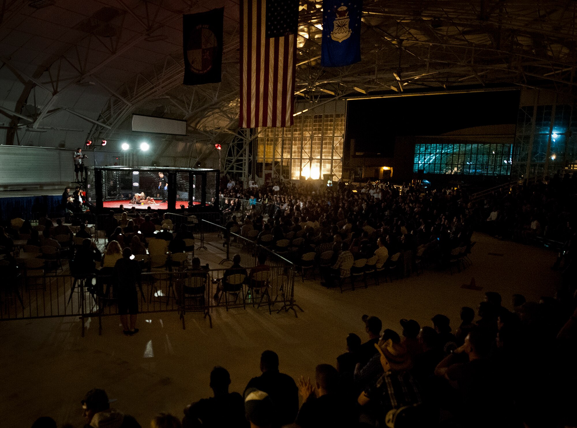 Approximately 775 people turned out for Strike Fight, Eglin Air Force Base’s first-ever mixed martial arts event Dec. 8.  Attendees were treated to 11 bouts, four of which ended in a technical knockout or submission. (U.S. Air Force photo/Samuel King Jr.)
