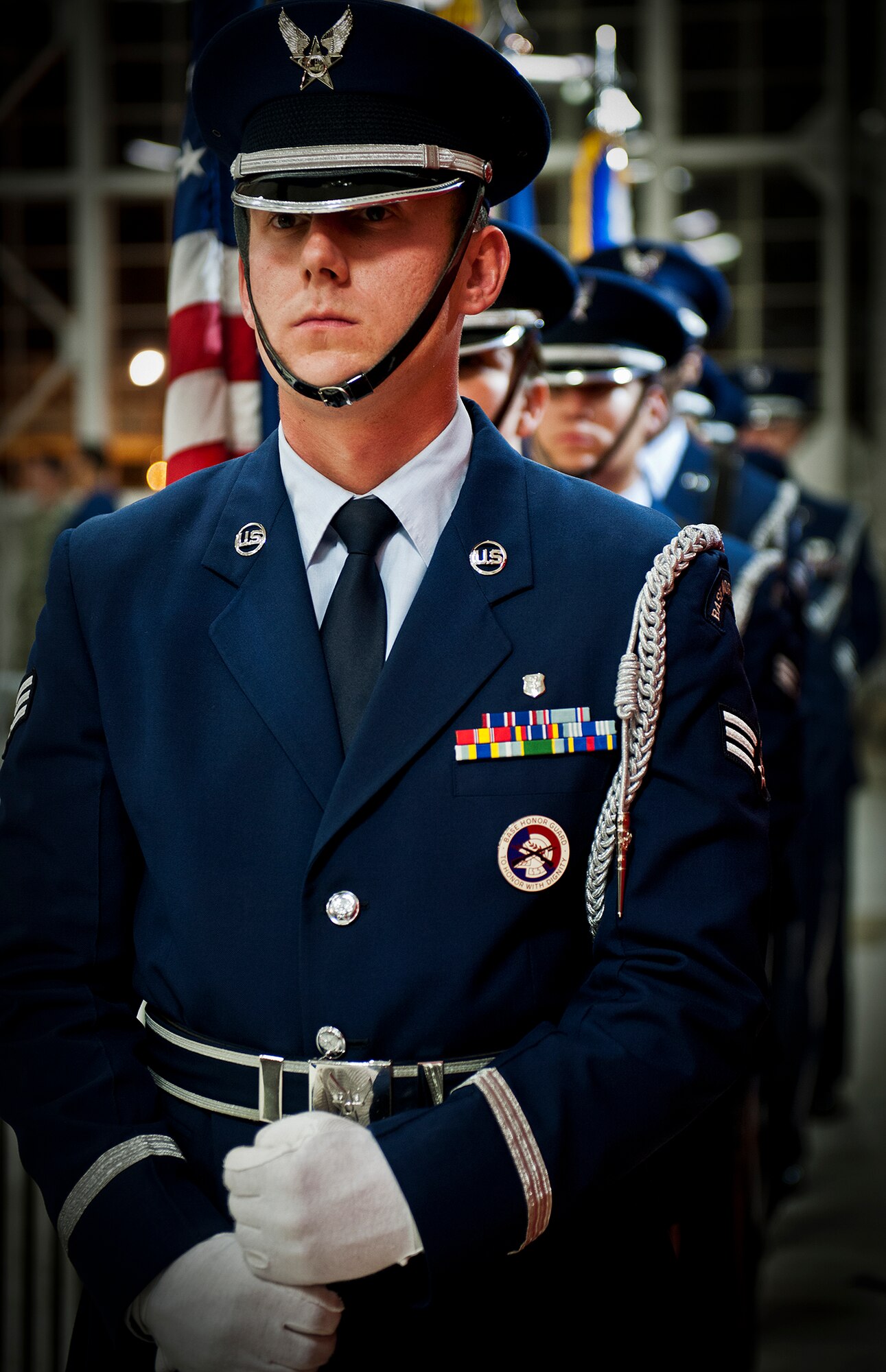 Honor Guard Airmen wait to bring in the colors to kick off the Strike Fight mixed martial arts event Dec. 8 at Eglin Air Force Base, Fla.  The base’s first-ever MMA event drew approximately 775 people.  (U.S. Air Force photo/Samuel King Jr.)