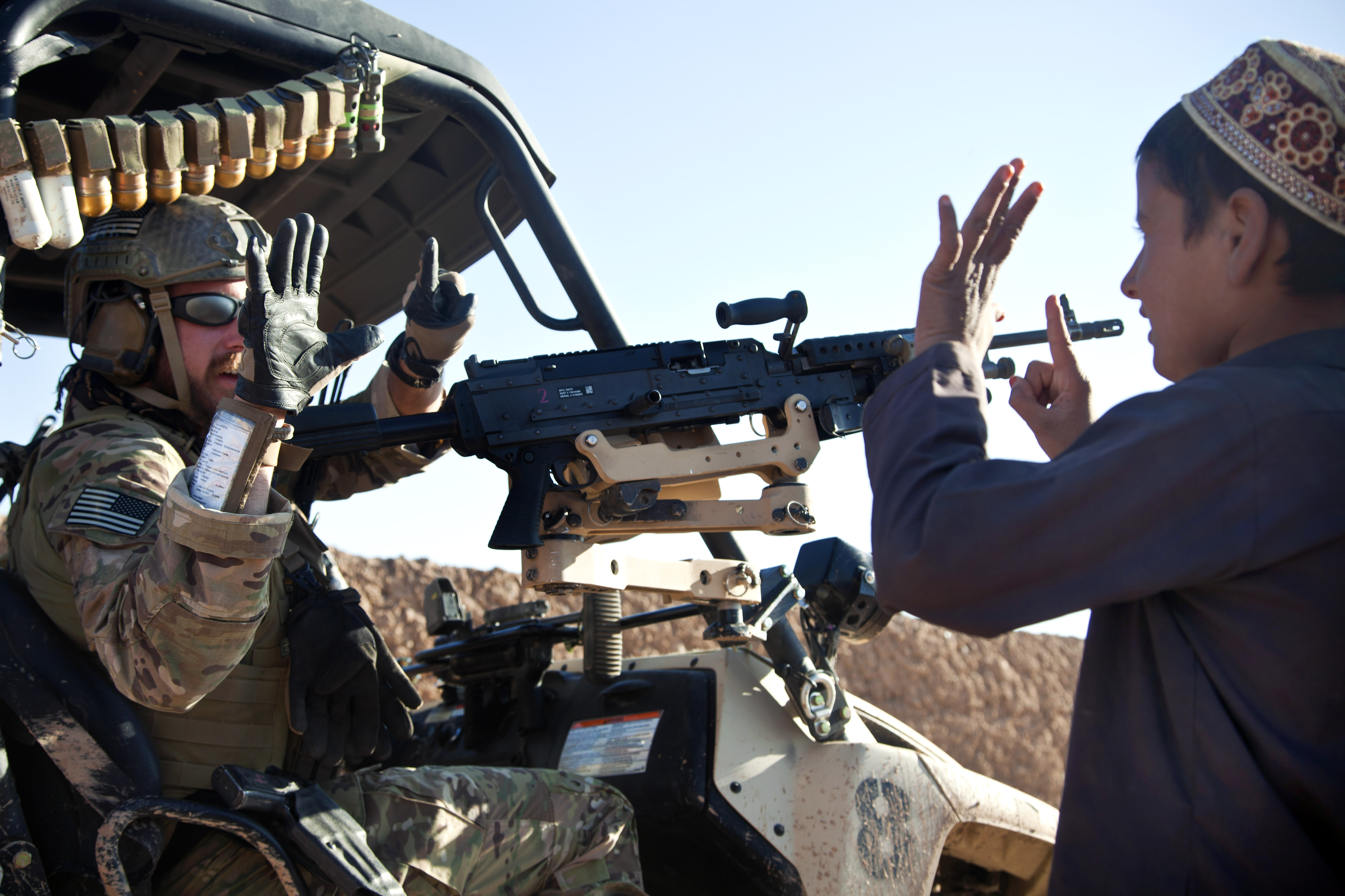A Coalition Force Member Teaches Children How To Count To 10