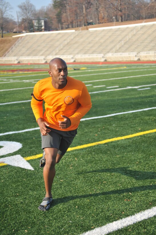 Cpl. Keith Elliott, administration chief for company office, Tenant Activities Company, aboard Marine Corps Base Quantico, runs around Butler Stadium during his regular workout on Dec. 7. Spartan Races are the self-proclaimed “world’s leading obstacle race series.” 