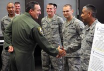 Lt. Gen. Stephen Mueller, Air Force Inspector General, speaks to Airmen from the 15th Maintenance Group at the combined maintenance facility Dec. 12 during a tour of 15th Wing units at Joint Base Pearl Harbor-Hickam, Hawaii. The IG reports to the Secretary and Chief of Staff of the Air Force on matters concerning Air Force effectiveness, efficiency, and the military discipline of active duty, Air Force Reserve and Air National Guard forces. The 15th MXG, in partnership with the Hawaii Air National Guard’s 154th Maintenance Group, care for a variety of aircraft including the C-17 Globemaster III, KC-135 Stratotanker, and F-22 Raptor. (U.S. Air Force photo by Staff Sgt. Nathan Allen)