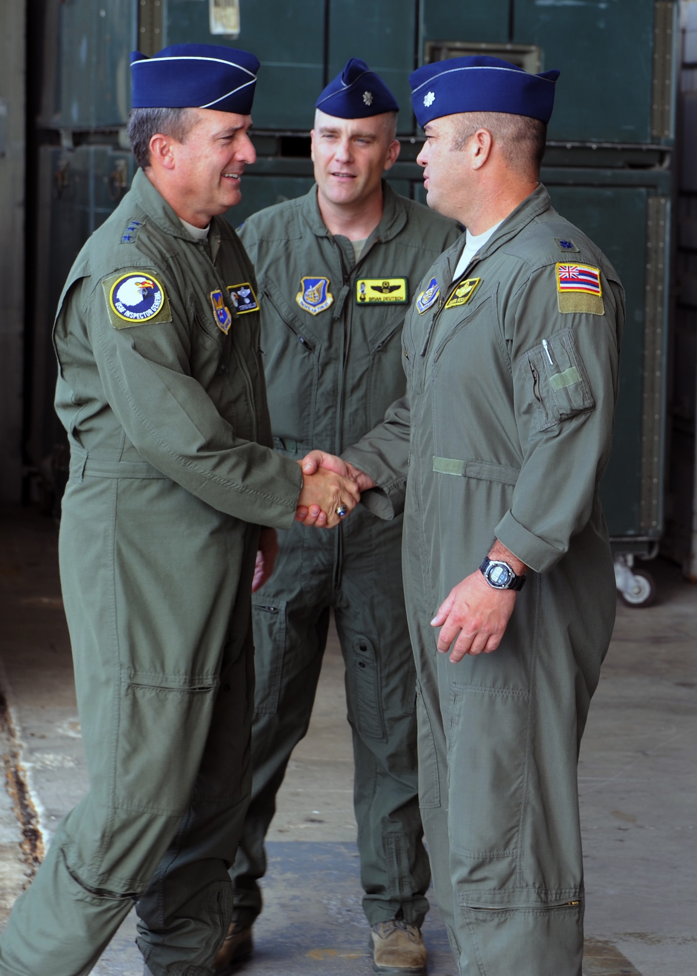 Lt. Gen. Stephen Mueller, Air Force Inspector General, is greeted by leaders from the 96th Air Refueling Squadron and 203rd Air Refueling Squadron Dec. 12 during a tour of 15th Wing units at Joint Base Pearl Harbor-Hickam, Hawaii. General Mueller chairs the Air Force Intelligence Oversight Panel, investigates fraud, waste and abuse; oversees criminal investigations, and provides oversight of complaints resolution programs. The history of the 96th ARS spans multiple aircraft throughout multiple theaters of war including campaigns around the world such as World War II, Pacific Anti-submarine, American Theater, Air Offensive over Japan, Eastern Mandates, Western Pacific, Ryukyus and the China Offensive. The air refueling mission came to Hawaii in 1993 with the arrival of the 203rd ARS. (U.S. Air Force photo by Staff Sgt. Nathan Allen)