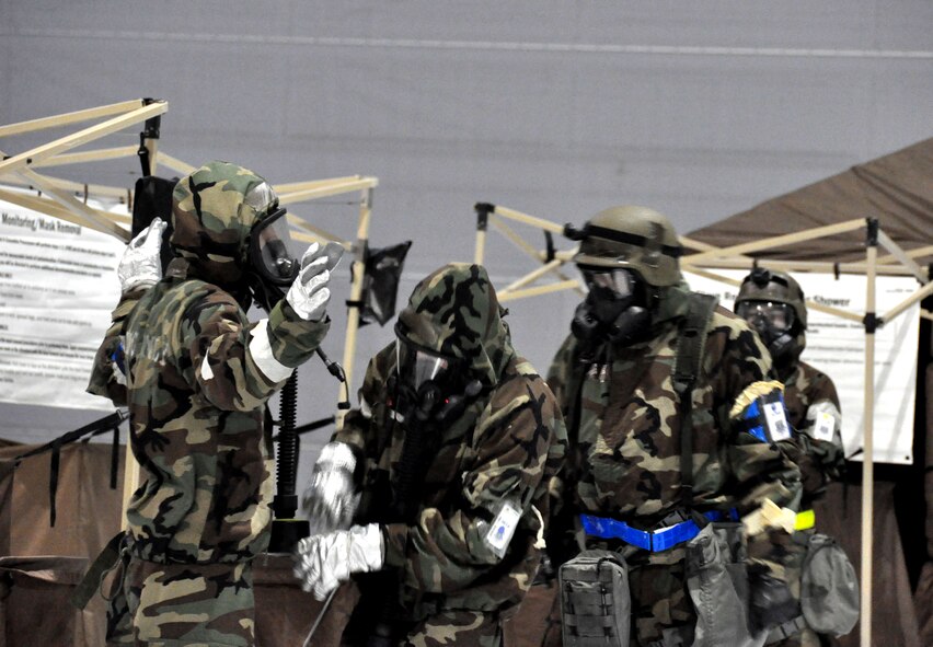 TRAVIS AIR FORCE BASE, Calif. -- Members of the 349th Air Mobility Wing and 60th AMW teamed up to participate in an Operational Readiness Exercise during the week of December 3, 2012 at the Gulfport Combat Readiness Training Center in Gulfport, Miss. ORE's are intended to train Airmen to deploy at a moments notice and be fully capable of establishing and maintaining a base under various threat conditions while in chemical warfare mission oriented protective equipment. (U.S. Air Force photo/ Senior Airman Amelia Leonard)