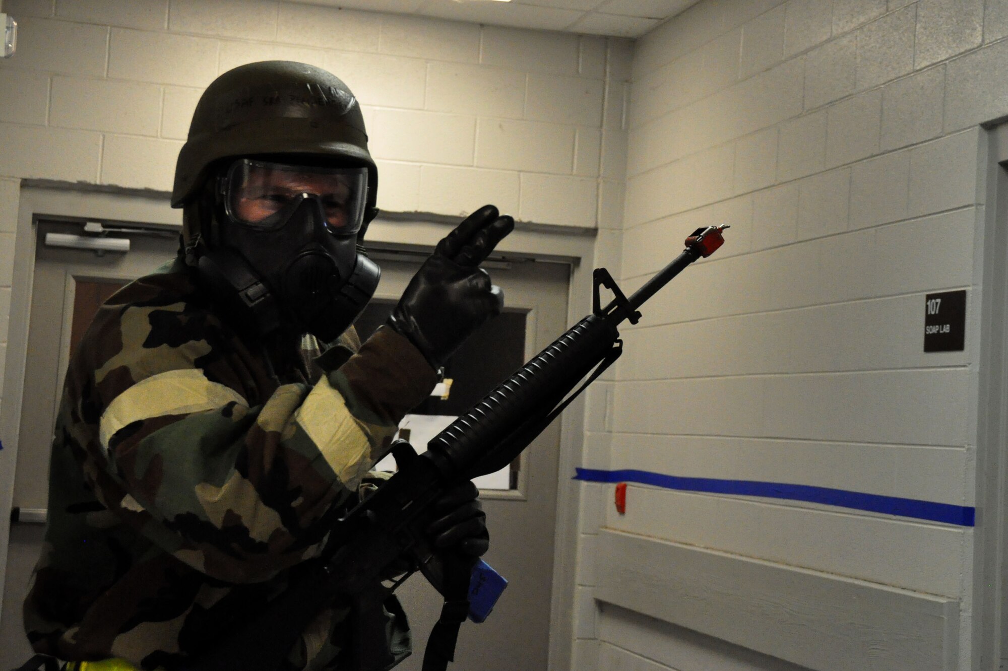 TRAVIS AIR FORCE BASE, Calif. -- Members of the 349th Air Mobility Wing and 60th AMW teamed up to participate in an Operational Readiness Exercise during the week of December 3, 2012 at the Gulfport Combat Readiness Training Center in Gulfport, Miss. ORE's are intended to train Airmen to deploy at a moments notice and be fully capable of establishing and maintaining a base under various threat conditions while in chemical warfare mission oriented protective equipment. (U.S. Air Force photo/ Senior Airman Amelia Leonard)