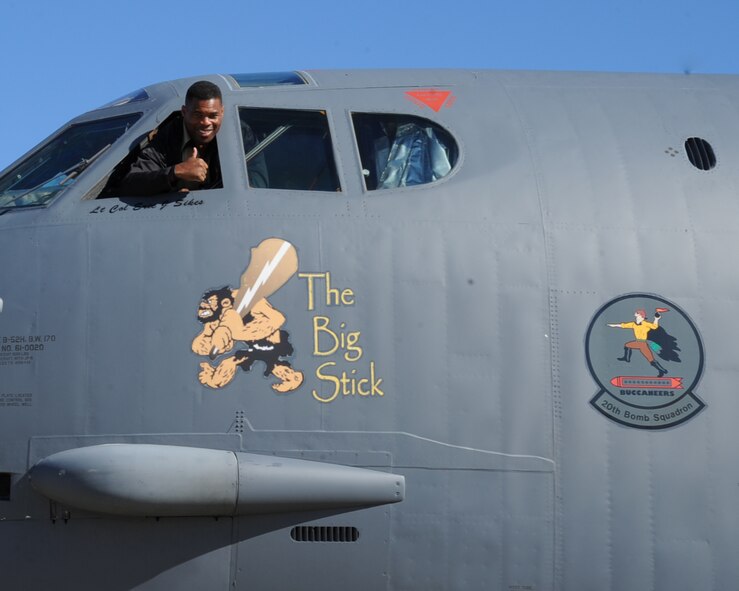Herschel Walker, former professional football player, gives the ?thumbs-up? from the cockpit of a B-52H Stratofortress during his visit to Barksdale Air Force Base, La., Dec. 11. During his visit, Walker spoke with Airmen about his career, signed autographs and posed for pictures and received a tour of a B-52H Stratofortress static display. (U.S. Air Force photo/Senior Airman Sean Martin)
