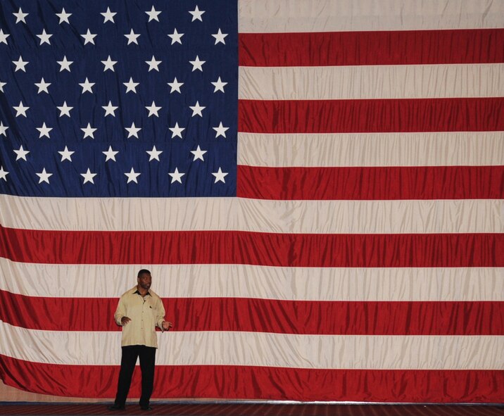 Herschel Walker, former professional football player, speaks to Airmen during his visit to Barksdale Air Force Base, La., Dec. 11. Walker was here on behalf of The Freedom Care Program Anti-Stigma Campaign. (U.S. Air Force photo/Senior Airman Sean Martin)