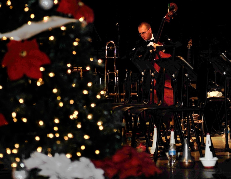 Airman 1st Class Chris Haughey, a bassist for the Air Force's Band of Mid-America at Scott, prepares for the holiday concert, "Together for the Holidays Dec. 9 at St. Louis Scottish Rite.  Haughey grew up in St. Louis and has been at Scott since Aug. 2011.  (U.S. Air Force photo/Staff Sgt. Maria Bowman)