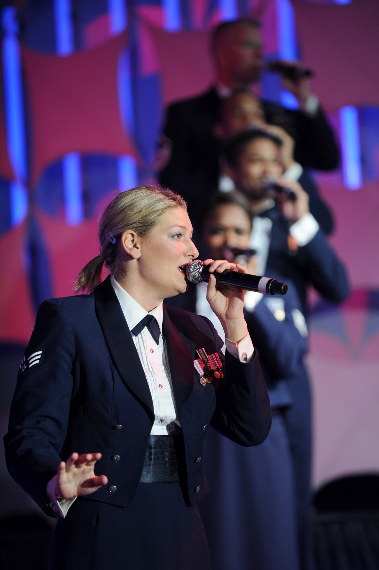 U.S. Air Force Senior Airman Joleen Dedmon, 944th Medical Squadron dental assistant apprentice from Luke Air Force Base, Ariz., performs during a Tops in Blue performance at the Base Theater Dec. 8, 2012, Eielson Air Force Base, Alaska. Tops in Blue is an Air Force expeditionary entertainment that raises morale and aids recruiting efforts. (U.S. Air Force photo/ Staff Sgt. Jim Araos)