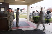 Airmen from the 902nd Security Forces Squadron attend the command dedication of their Operation Iraqi Freedom and Operation Enduring Freedom Defenders Wall Dec. 6. The memorial wall is in the 902nd SFS building at Joint Base San Antonio-Randolph honoring nine fallen Airman. (U.S. Air Force photo by Joshua Rodriguez)