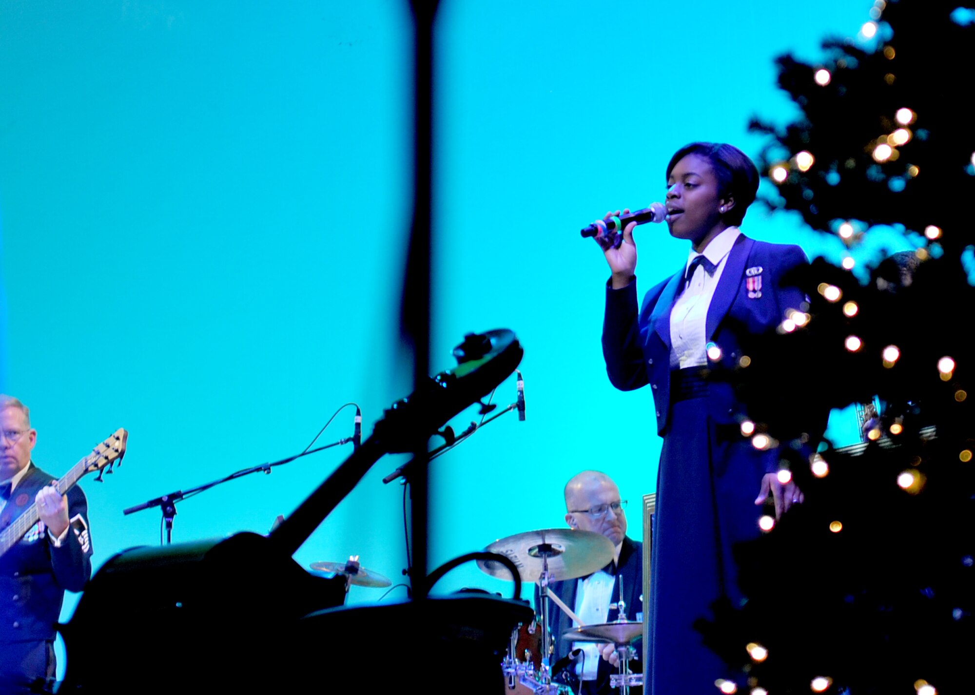 Airman 1st Class Paula Kynard, vocalist with the U.S. Air Force Heartland of America Band, sings the holiday favorite “All I want for Christmas is you”. The band performed various holiday favorites at the Holland Performing Arts Center in Omaha, Neb., Dec. 7. (U.S. Air Force photo by Jeff W. Gates/Released)