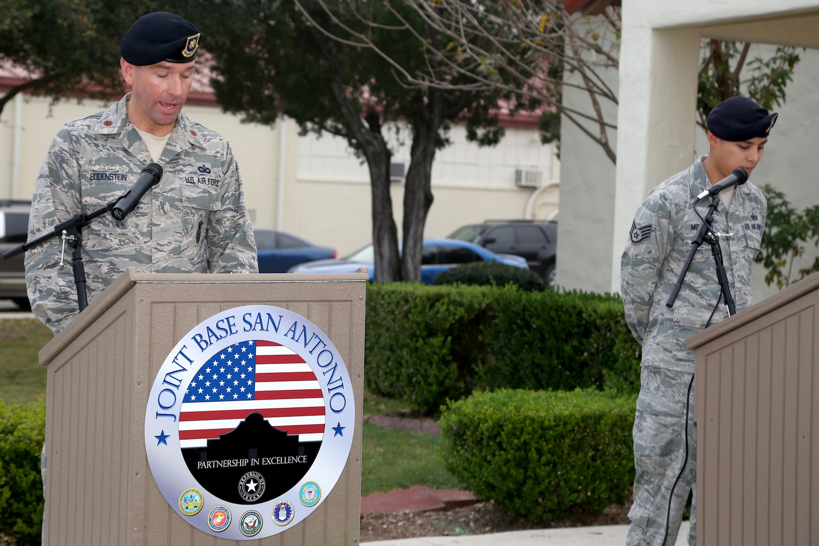 Airmen from the 902nd Security Forces Squadron attend the command dedication of their Operation Iraqi Freedom and Operation Enduring Freedom Defenders Wall Dec. 6. The memorial wall is in the 902nd SFS building at Joint Base San Antonio-Randolph honoring nine fallen Airman. (U.S. Air Force photo by Joshua Rodriguez)