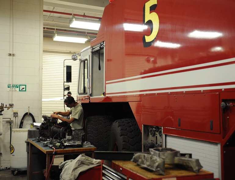 Senior Airman Marcus Smith, 2nd Logistics Readiness Squadron fire truck maintenance journeyman, repairs a generator on Barksdale Air Force Base, La., Dec. 10. For lights that require more power to function, a generator is used to supply the fire truck with electricity to power them. Because of their importance to the mission, fire trucks require Airmen who specialize in maintaining them. (U.S. Air Force photo/Airman 1st Class Benjamin Gonsier)
