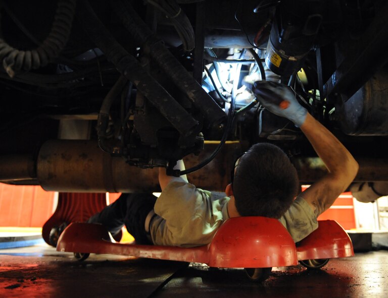 Airman 1st Class Timothy Bailey, 2nd Logistics Readiness Squadron fire truck maintenance apprentice, replaces the pump packing of a P-22 fire truck on Barksdale Air Force Base, La., Dec. 10. The pump packing is a seal that prevents leakage during the water pumping process. (U.S. Air Force photo/Airman 1st Class Benjamin Gonsier)