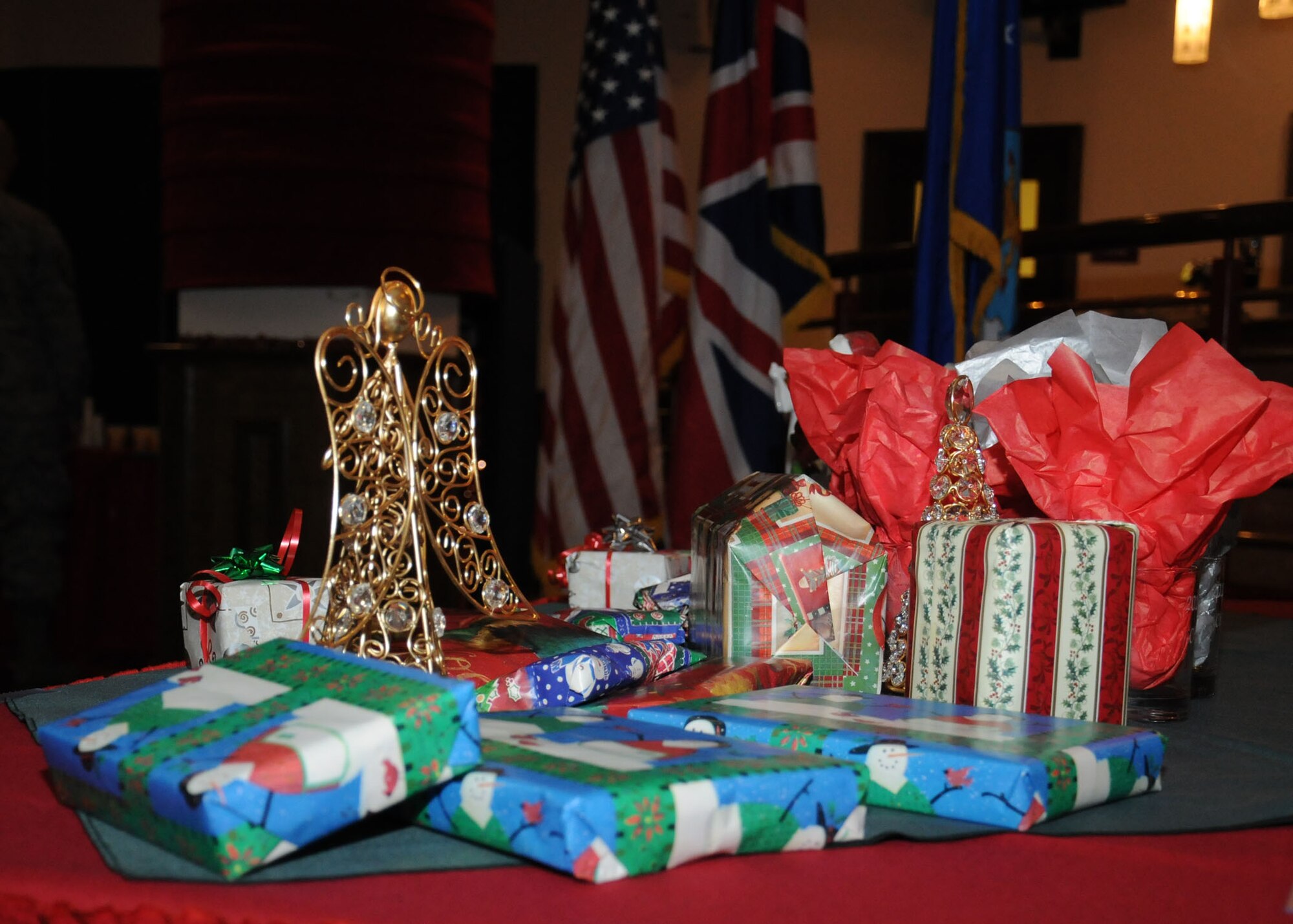 Gifts for the raffle are arranged on a table Dec. 12, 2012, at RAF Mildenhall, England. Fifty volunteers from Team Mildenhall helped prepare for the event as well as serve on the day. (U.S. Air Force photo by Gina Randall/Released)