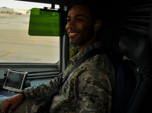Airman Matt Indelicato, 373rd Training Squadron crew chief student,  sits in the flight deck of a C-17 Globemaster III during an incentive flight Dec. 6, 2012, at Joint Base Charleston – Air Base. More than 50 quarterly award winners attended the incentive flight onboard two C-17s which were conducting air drop training missions at Joint Base Charleston’s – North Auxiliary Air Field. (U.S. Air Force photo/ Airman 1st Class Jared Trimarchi)