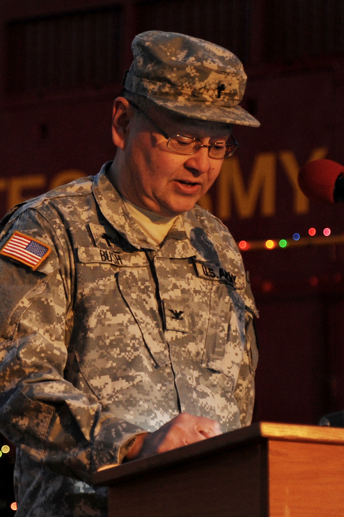 U.S. Army Chaplain (Col.) Timothy D. Smith, Joint Base Langley-Eustis deputy chief of chaplains and Fort Eustis senior chaplain, reads the evening's scripture during the annual Fort Eustis Christmas Tree Lighting celebration at Seay Plaza on Fort Eustis, Va., Dec. 6, 2012. More than 300 guests attended the tree lighting ceremony, which featured holiday music, caroling and a visit from Santa Claus. (U.S. Air Force photo by Airman 1st Class Victoria Taylor/Released)