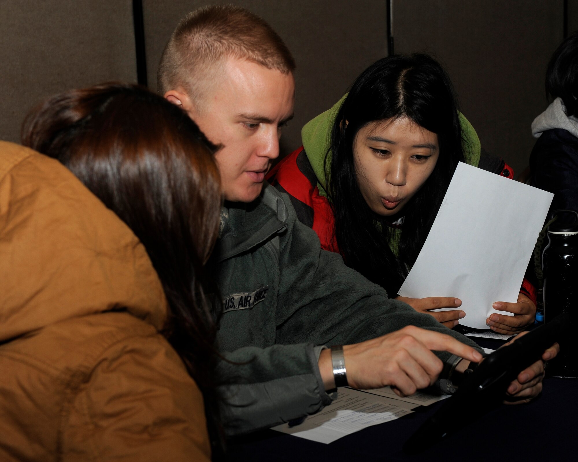 2nd Lt. Joshua Hovies, 8th Force Support Squadron, volunteers during the Gunsan National University student exchange on Kunsan Air Base, Republic of Korea, Nov. 27, 2012. The program allowed the students to see different Air Force jobs and how they work together. (U.S. Air Force photo by Senior Airman Marcus Morris/released)