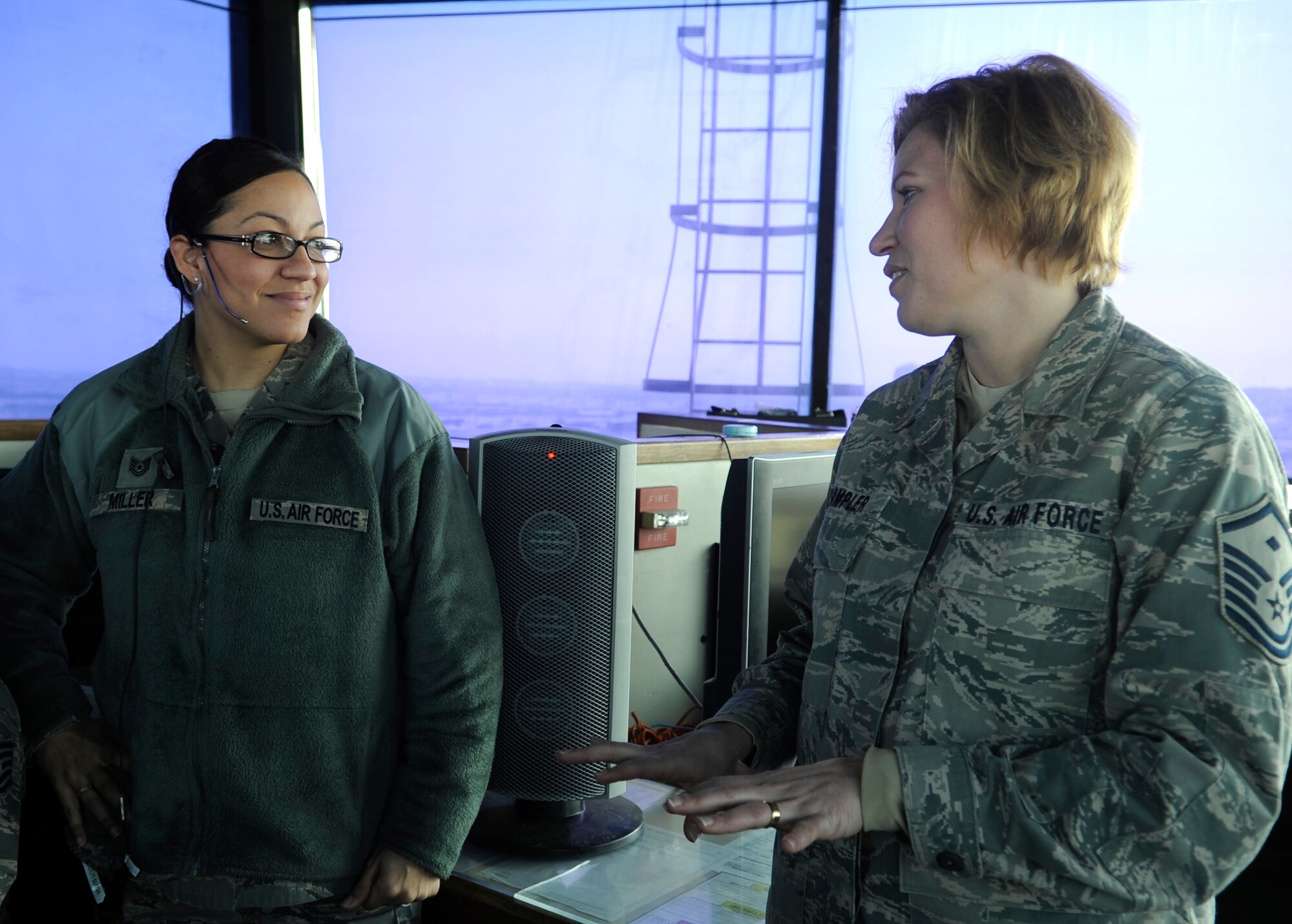 Master Sgt. Jennifer Wampler, outgoing 8th Operations Group first sergeant, says goodbye to Tech. Sgt. Deniece Miller, 8th Operations Support Squadron assistant chief controller, Dec. 11, 2012, at Kunsan Air Base, Republic of Korea. Wampler said she is proud to have gotten to know Airmen in the 8th OG. (U.S. Air Force photo by Senior Airman Brigitte N. Brantley/Released)