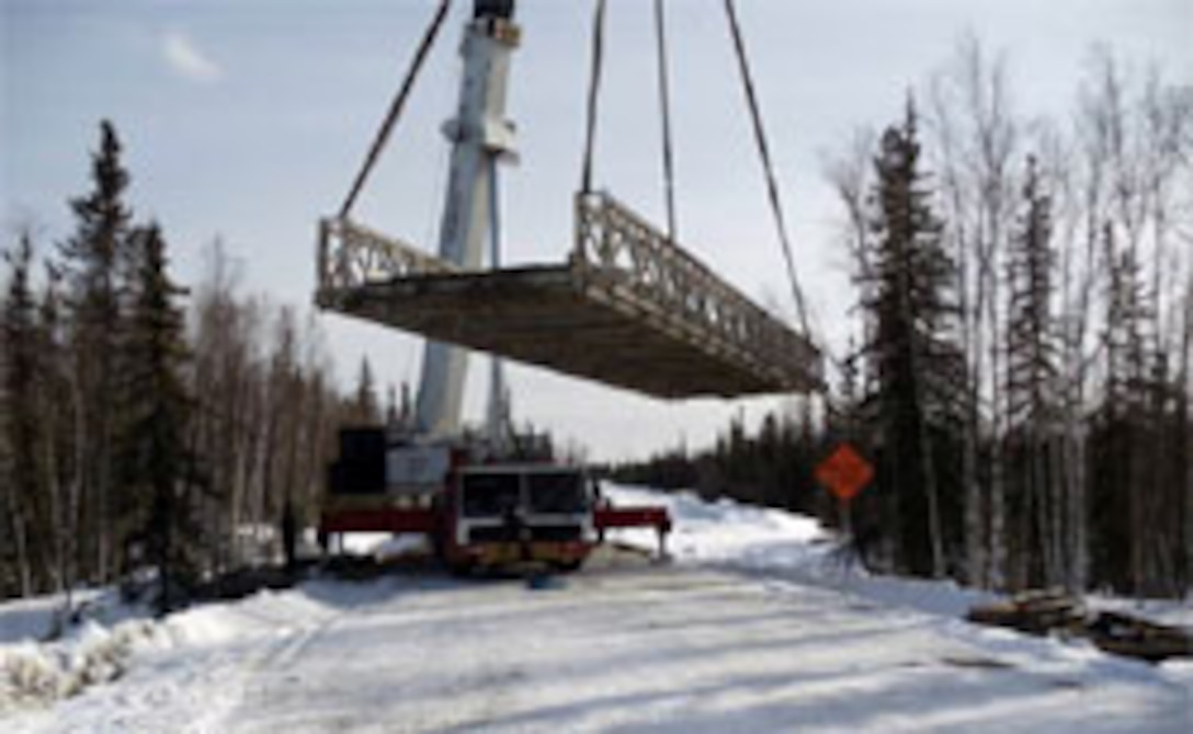 The Bailey bridge was lifted from the abutments so work could be conducted on the roadway to protect an environmentally sensitive stream. 