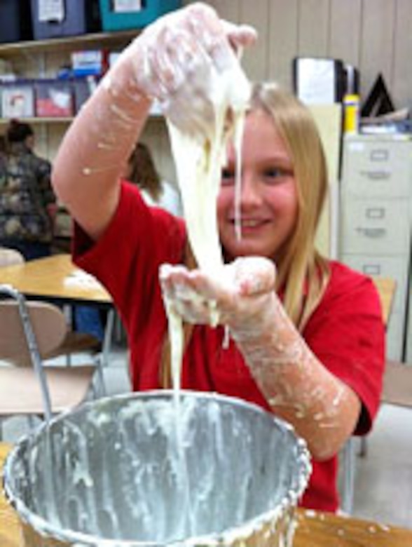 A student from the Bovina Elementary School Gifted and Talented Educational Services program participates in an engineering experiment at the school. ERDC staff members visited the school as part of outreach efforts by ERDC-Vicksburg.