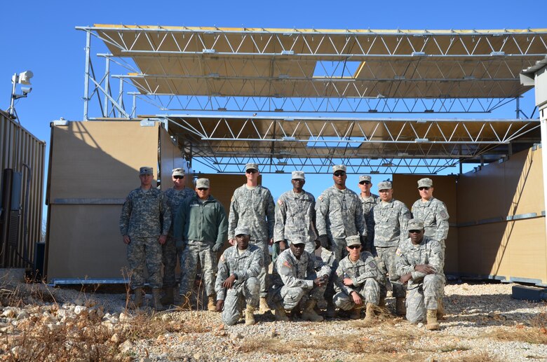 Members of the 82nd Airborne Division pose in front of the newly constructed MPS-OHC in Afghanistan. 