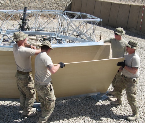 Members of the 82nd Airborne Division put the MPS Mortar Pit together in Afghanistan. 