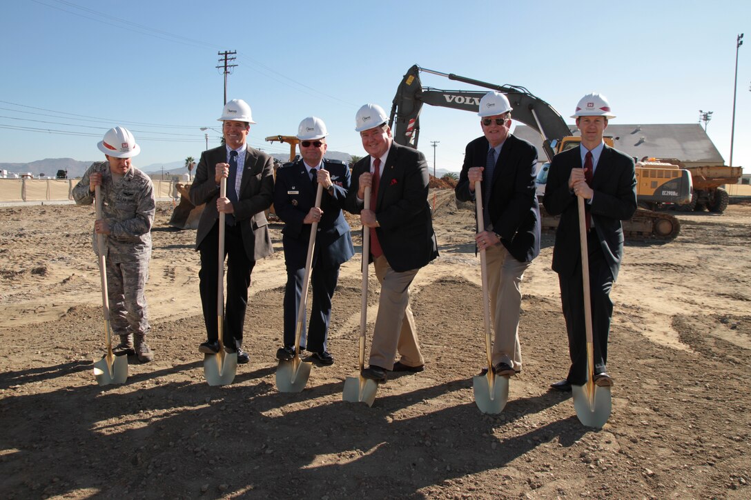 Rep. Ken Calvert, center right, takes part in ground breaking ceremonies Dec. 8 for March Air Reserve Base's new 16,000 sq. foot airfield traffic control tower and base operations facility. Joining him are, from the left, Col. Tim McCoy, contract partner David Parkes, Col. Bo Mahaney, Moreno Valley Mayor Richard Stewart and David Van Dorpe, District deputy engineer for programs and project management.