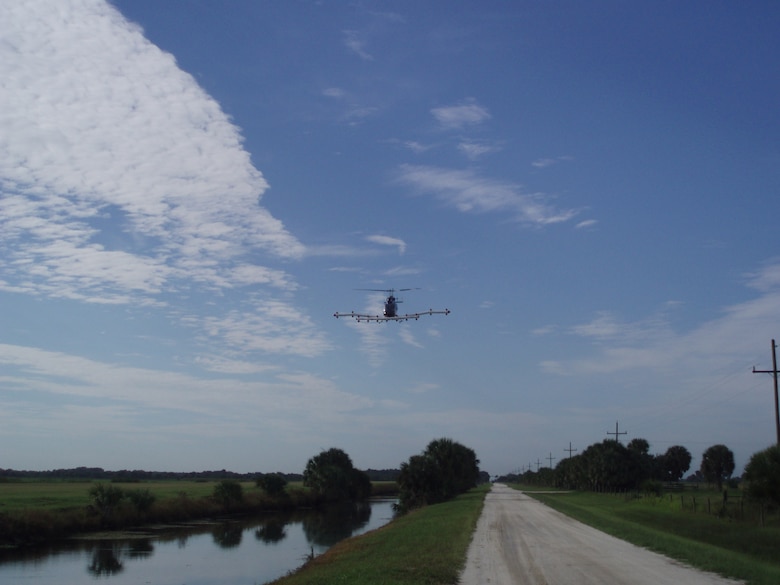 The open prairie-type conditions at Avon Park Formerly Used Defense Site are ideal for using the helicopter magnetometer to search for munitions debris at the site. Flying about 30 to 40 mph, the helicopter detects ferrous metallic debris. 