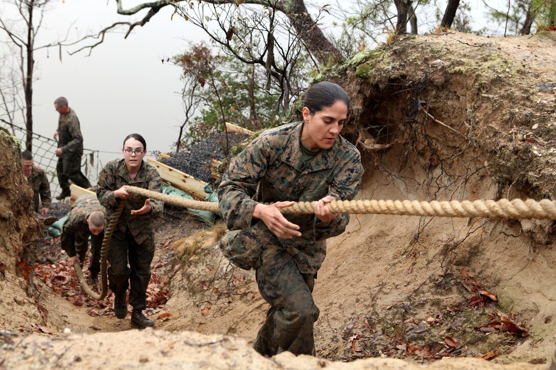 121208-M-NK962-178
QUANTICO, Va. (Dec. 8, 2012) Officer Candidate School students negotiate the Montford Point Challenge obstacle course at Marine Corps Base Quantico, Va. The Montford Point Challenge was designed in 2011 to give Candidates a taste of the hardships of the first African-Americans allowed to enlist in the Marine Corps. (U.S. Marine Corps photo by Sgt. Christopher A. Green/Released)