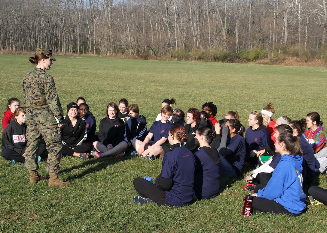 Capt. Casey Chenoweth, officer selction officer, Officer Selection Office West Lafayette, RS Indianapolis, speaks to a group of female poolees before begining a 3-mile hike on Harrison State Park, Indianapolis, Nov. 17.