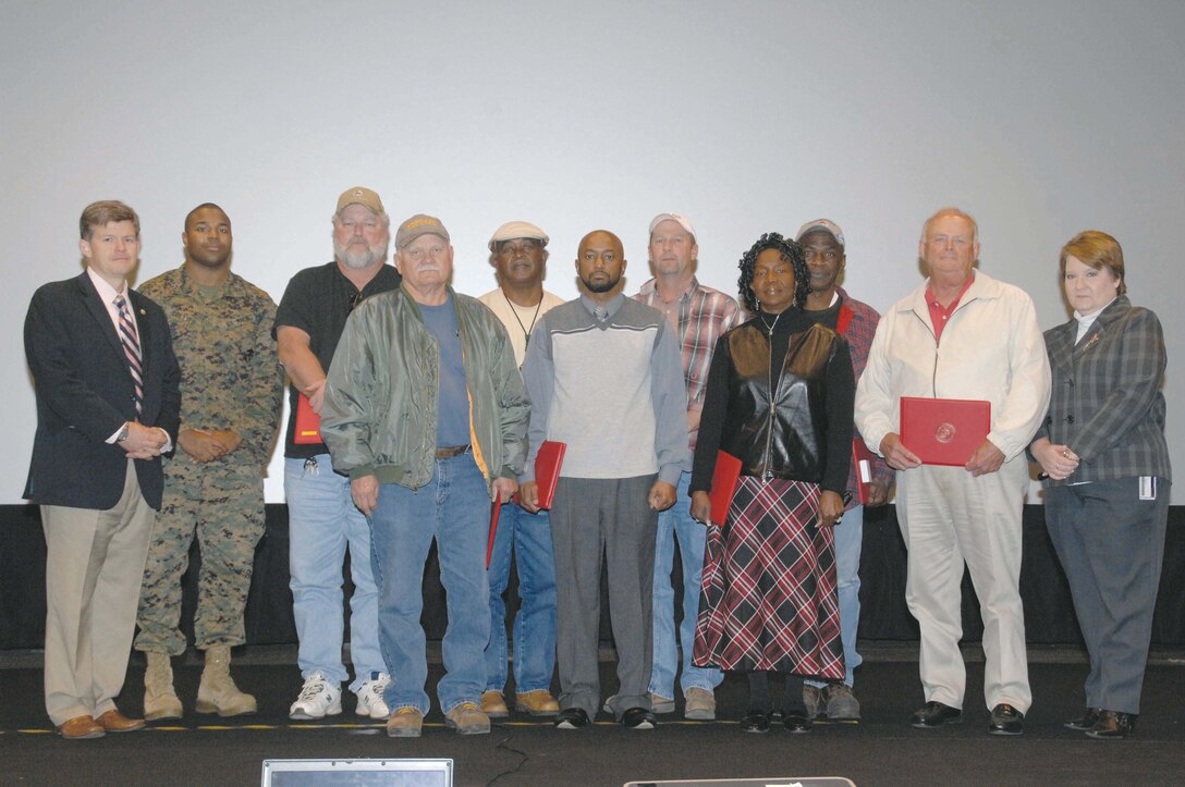 Logistics Support Division leaders conduct a safety stand-down in the Base Theater, Nov. 28. Numerous employees received recognition for length of service and safety as well as letters and         certificates of appreciation presented by Clay Hargis, director and Kelly Eadie, deputy director.