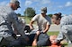 ANDERSEN AIR FORCE BASE, Guam--Medical responders stabilize a simulated neck injury victim during the Expeditionary Medical Support Health Response Team training on Andersen Air Force Base, Guam, Dec. 12, 2012. The exercise focused on mass-casualty training scenarios and humanitarian aid in response to crisis situations. During the weeklong exercise, medical Airmen from Joint Base Elmendorf-Richardson, Alaska, Yokota Air Base, Japan and Andersen worked together in setting up and training in the EMEDS HRT tents.( U.S. Air Force Photo by Staff Sgt. Alexandre Montes/Released)