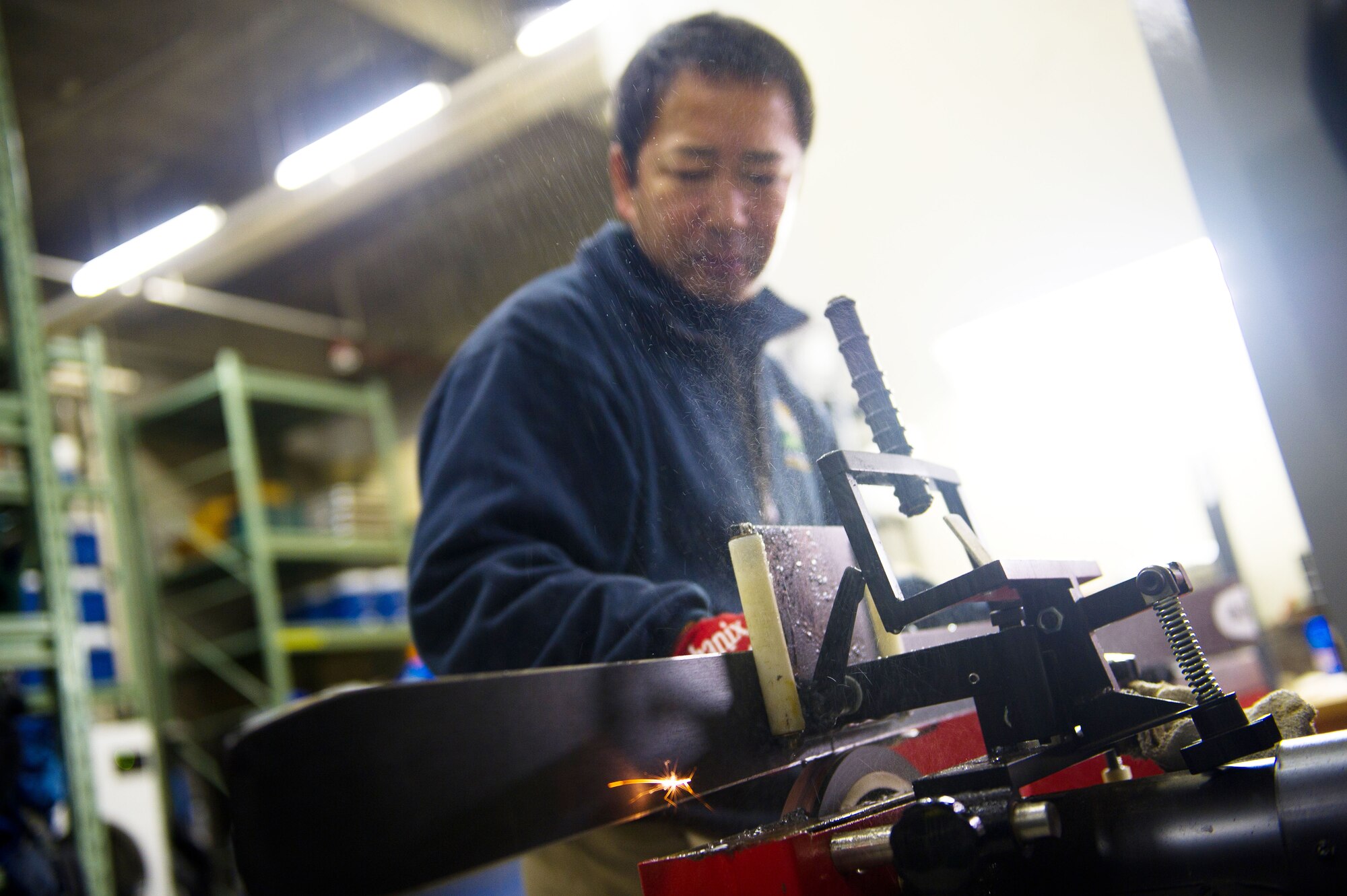 YOKOTA AIR BASE, Japan – Sakano Masa, 374th Force Support Squadron Outdoor Recreation maintenance technician, sharpens a ski prior to waxing on Yokota Air Base, Japan, on Dec. 11, 2012. Sharpening and waxing are two of several services Outdoor Recreation offers during the winter months. (U.S. Air Force photo by Staff Sgt. Chad C. Strohmeyer)