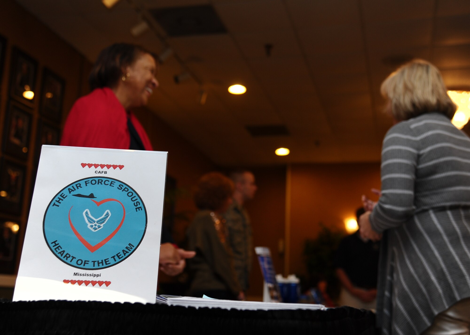 Members of organizations around Columbus Air Force Base come together to meet with spouses of Columbus AFB members during Heartlink Dec. 12 at the Columbus Club.  Heartlink welcomes spouses of new Air Force and Columbus AFB members and informs them of the organizations and other opportunities available to them on-base and in the local community.  (U.S. Air Force Photo/Airman 1st Class Charles Dickens)