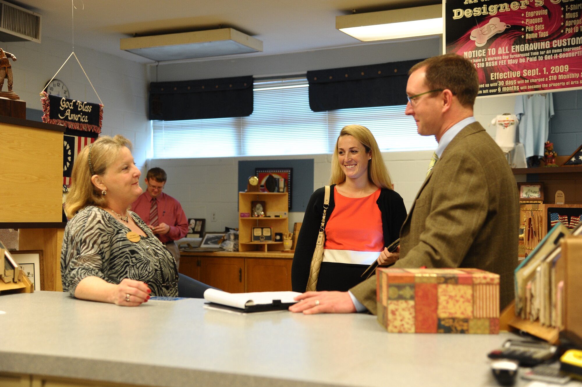 Chris Bowers, 14th Force Support Squadron Arts and Crafts Director speaks to Services Transformation Initiative team members Angela Scotty-Weber and Rick Gates about the Arts and Crafts operation here on Columbus Air Force Base Dec. 5. The Services Transformation Initiative is working to move base services from a ‘one size fits all’ approach to services tailored to meet the needs and wants of the base’s population. (U.S. Air Force photo/Senior Airman Chase Hedrick)
