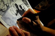 Airman 1st Class John Yurcaba IV, 1st Combat Camera Squadron broadcaster, shades a comic book drawing in his dorm room at Joint Base Charleston – Air Base, S.C. Yurcaba is currently working on a comic series focused around a character he created named Finch. (U.S. Air Force photo/ Senior Airman Dennis Sloan)