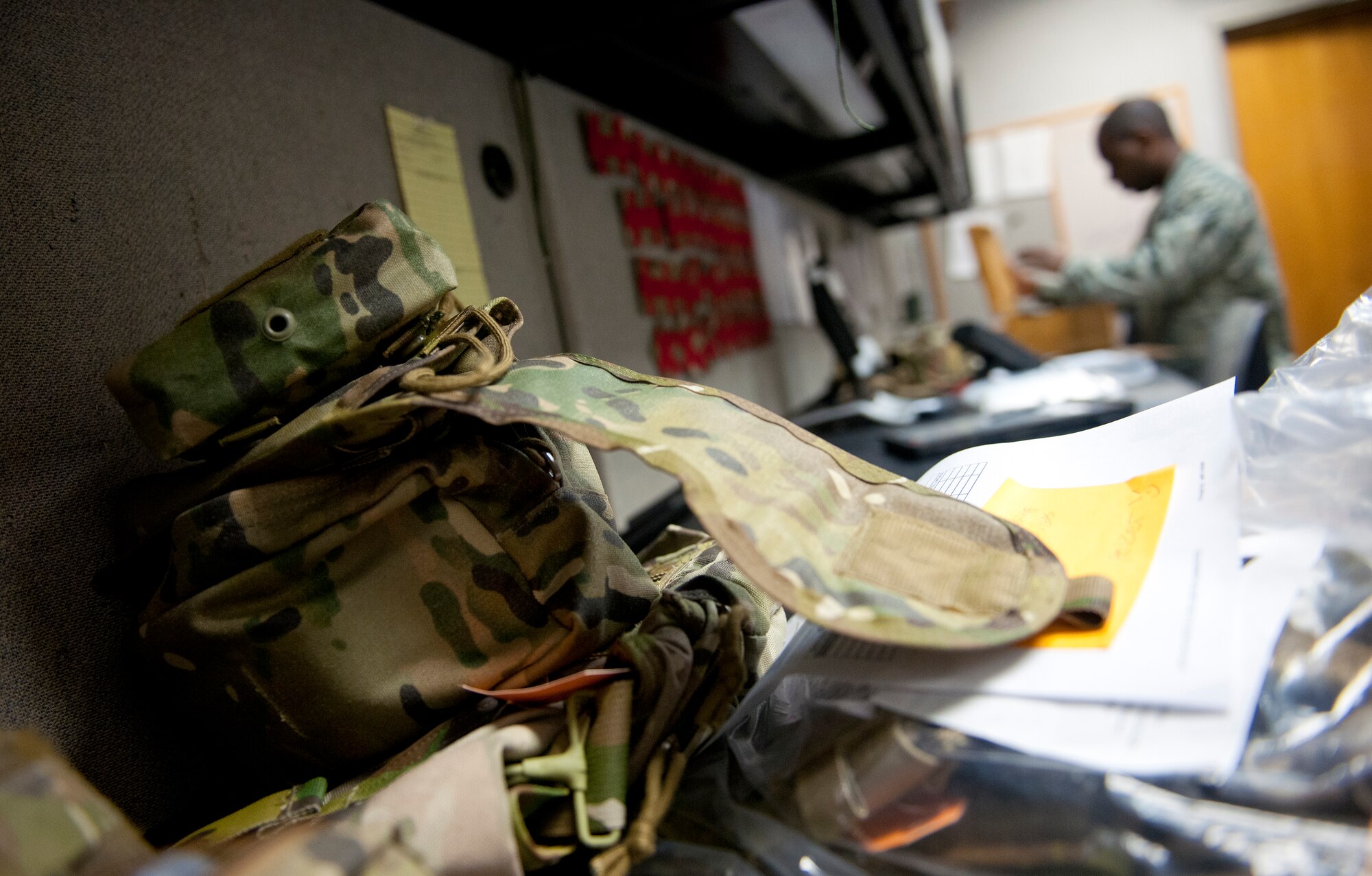 An aircrew survival vest sits on a worktable at Moody Air Force Base, Ga., Dec. 6, 2012. One of the duties of AFE technicians is to inspect, repair and supply equipment for aircrew members. (U.S. Air Force photo by Airman 1st Class Jarrod Grammel/Released)
