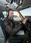Capt. Mike Vilven, 384th Air Refueling Squadron chief executive officer, performs a pre-flight check onboard a KC-135 Stratotanker Dec. 11, 2012, McConnell Air Force Base, Kan. Vilven was selected as the spotlight performer for the week of Dec. 10 to 14, 2012, for his dedication to the 22nd Air Refueling Wing commander’s intents. (U.S. Air Force photo/Airman 1st Class Victor J. Caputo)