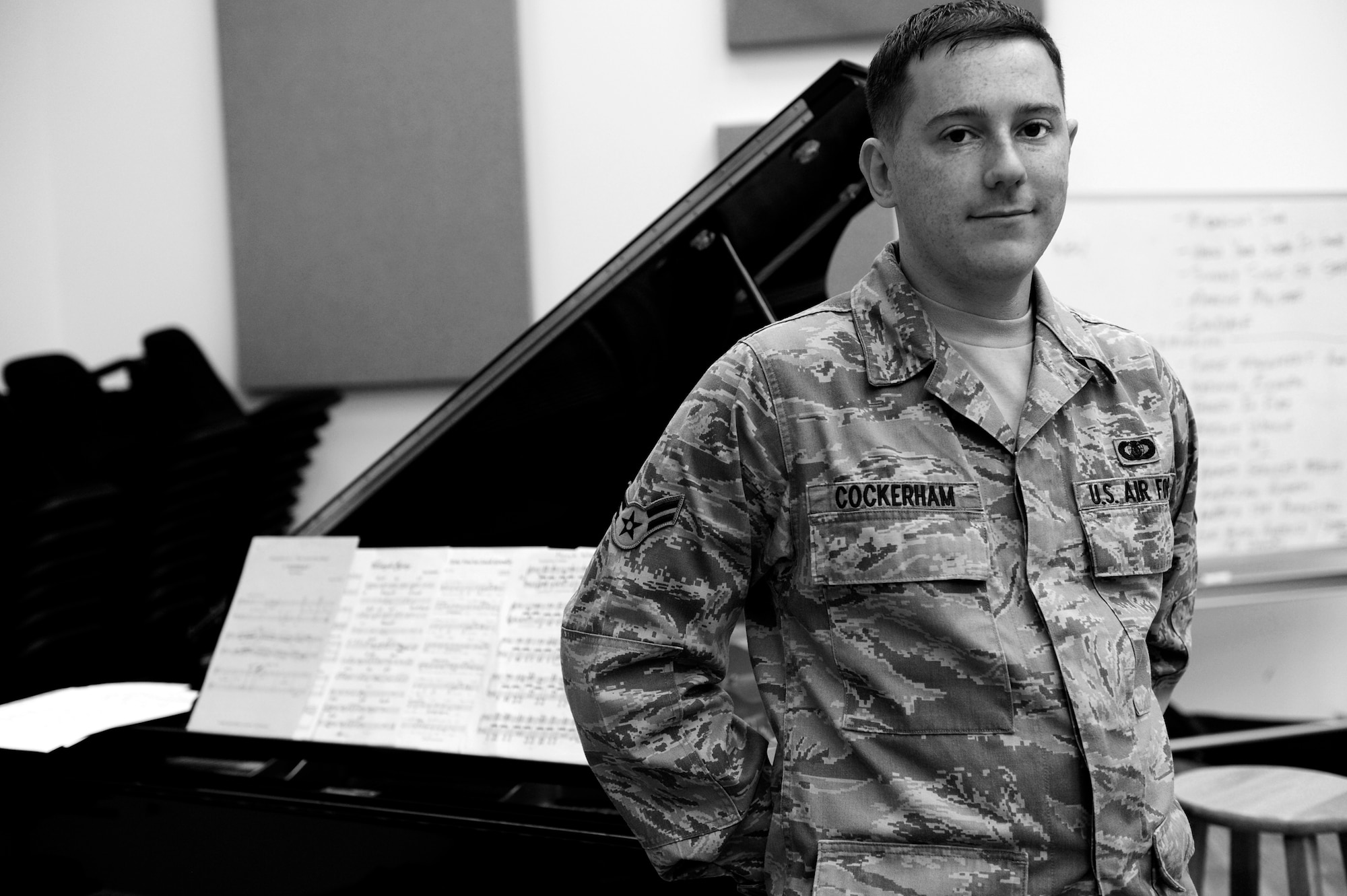 Airman 1st Class Justin Cockerham plays the piano during rehearsal Nov. 7 at Langley Air Force Base, Va. Cockerham brings to the Heritage of America band over 20 years of piano playing experience. (U.S. Air Force photo by Sachel Seabrook/Released)