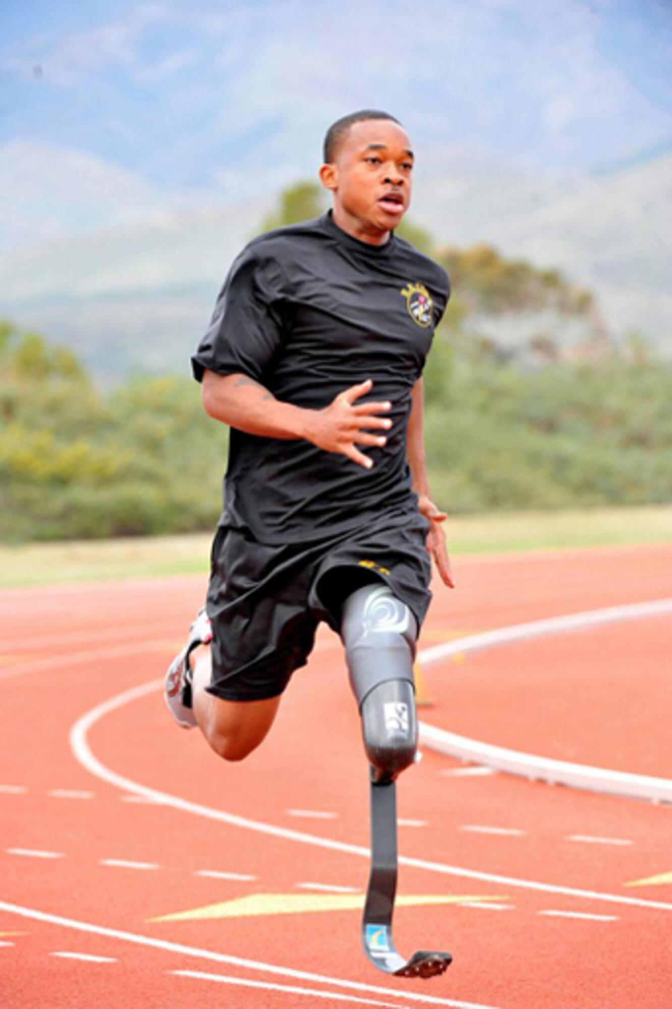 U.S. Army Sgt. Jerrod D. Fields sprints around the track as part of the U.S. Army World Class Athlete Program. (U.S. Army courtesy photo/Released)
