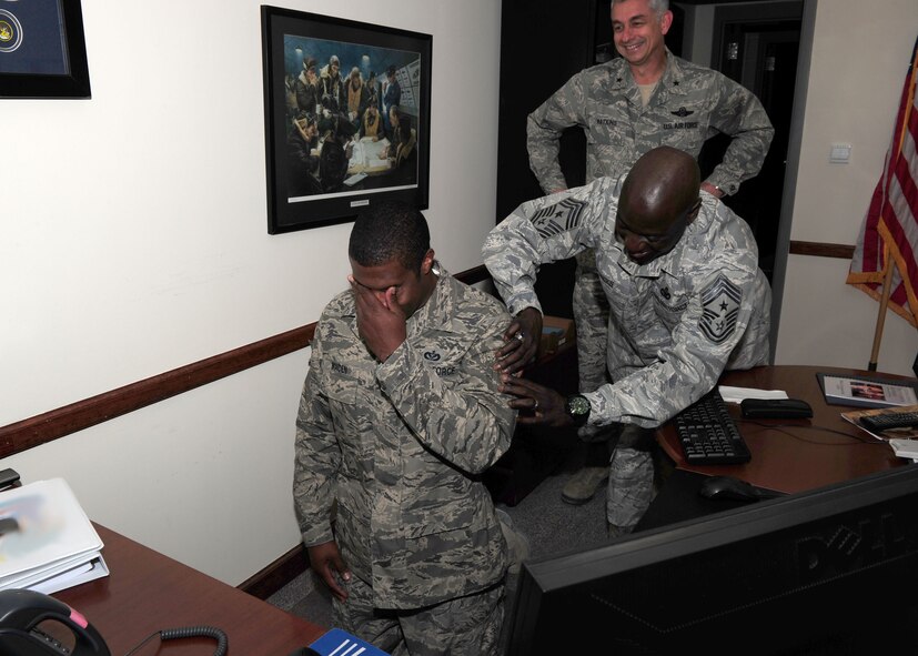 Staff Sgt. Willie Maiden, deployed to the 379th Expeditionary Civil Engineer Squadron in Southwest Asia from Barksdale is STEP promoted by 379th CES leadership Dec. 6. Maiden was officially notified of his Stripes For Excellent Performers promotion via video teleconference by the 2nd Bomb Wing Commander Andrew Gebara. (Photo courtesy of 379th Expeditionary Wing Public Affairs) 