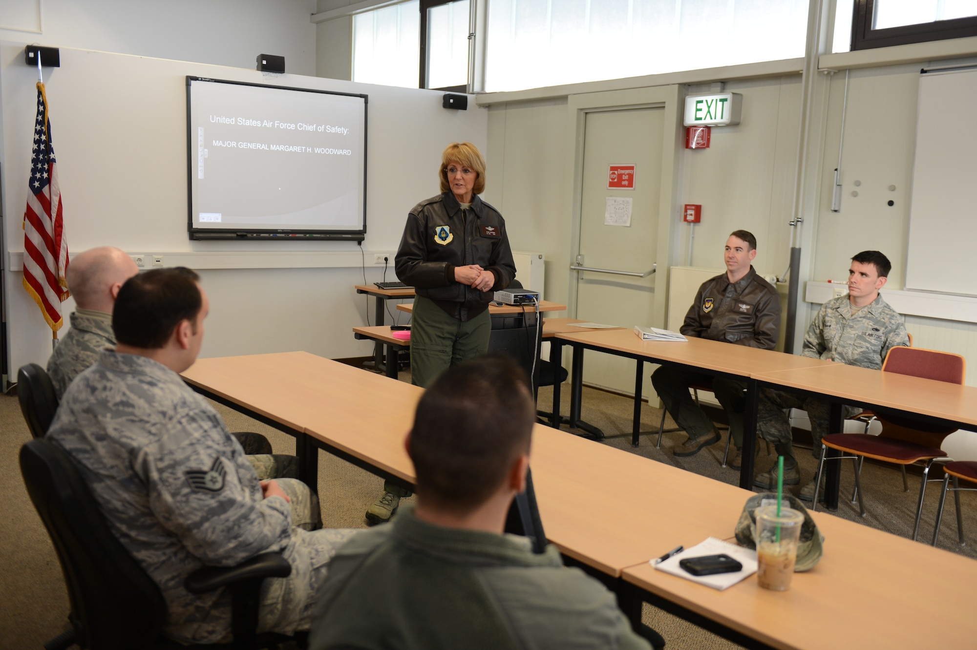 SPANGDAHLEM AIR BASE, Germany – U.S. Air Force Maj. Gen. Margaret Woodward, Air Force Chief of Safety, speaks at a weapons safety representative meeting inside the 52nd Fighter Wing Safety office Dec. 12, 2012. During her familiarization tour, Woodward met and spoke with Airmen from safety’s three functional areas: weapons, ground and flight safety. The representatives briefed the general on the wide gambit of Spangdahlem’s safety operations. (U.S. Air Force photo by Airman 1st Class Gustavo Castillo/Released)