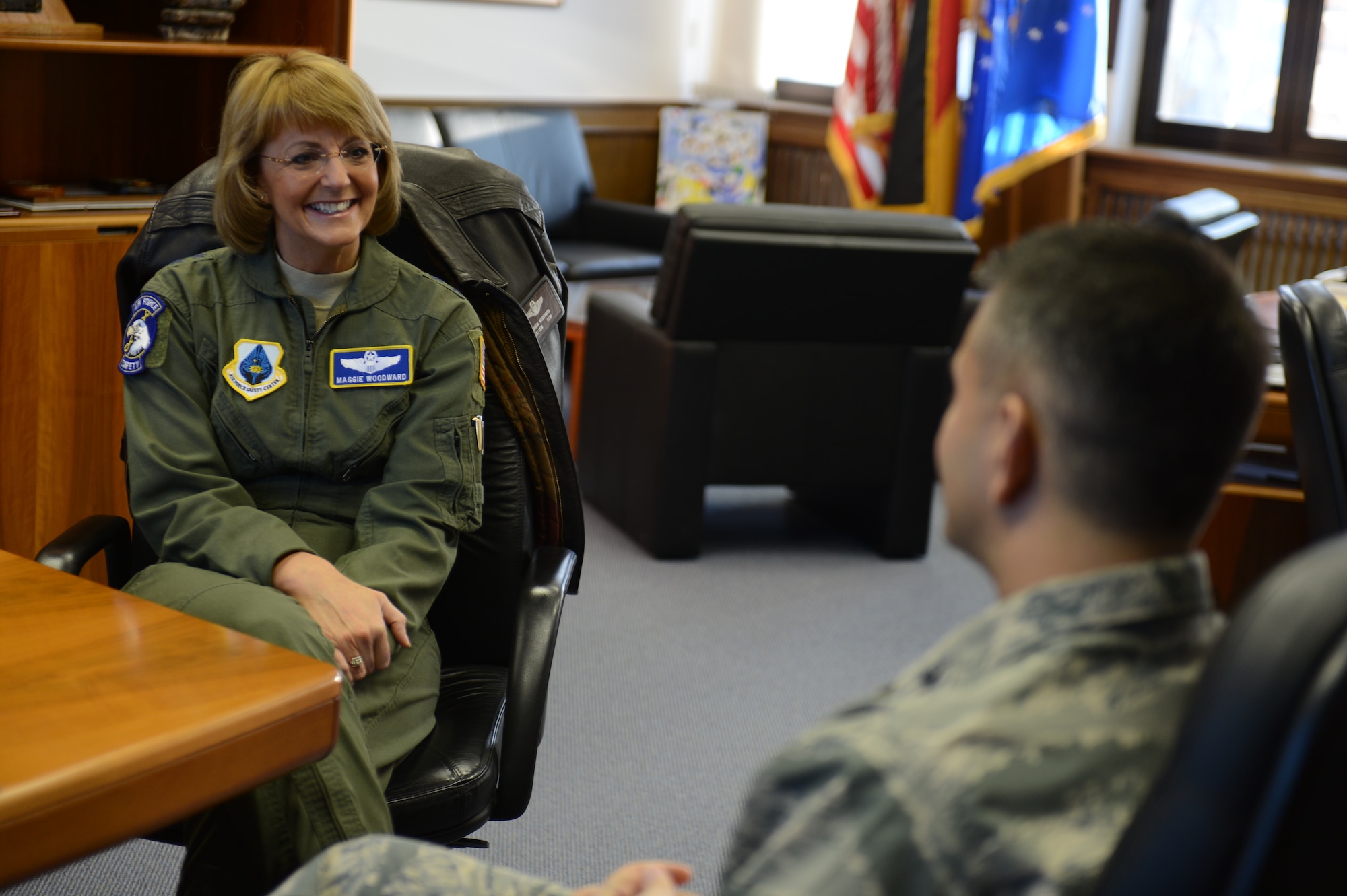 SPANGDAHLEM AIR BASE, Germany – U.S. Air Force Maj. Gen. Margaret Woodward, Air Force Chief of Safety, speaks with Col. David Julazadeh, 52nd Fighter Wing commander, in the 52nd FW headquarters building Dec. 12, 2012. Woodward toured Spangdahlem AB to familiarize herself with daily 52nd FW safety operations. (U.S. Air Force photo by Airman 1st Class Gustavo Castillo/Released)