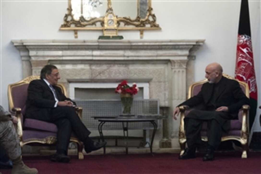 Secretary of Defense Leon E. Panetta, left, meets with Afghan President Hamid Karzai in Kabul, Afghanistan, on Dec. 13, 2012.  Panetta and Karzai are meeting to discuss regional security items of interest to both nations.  