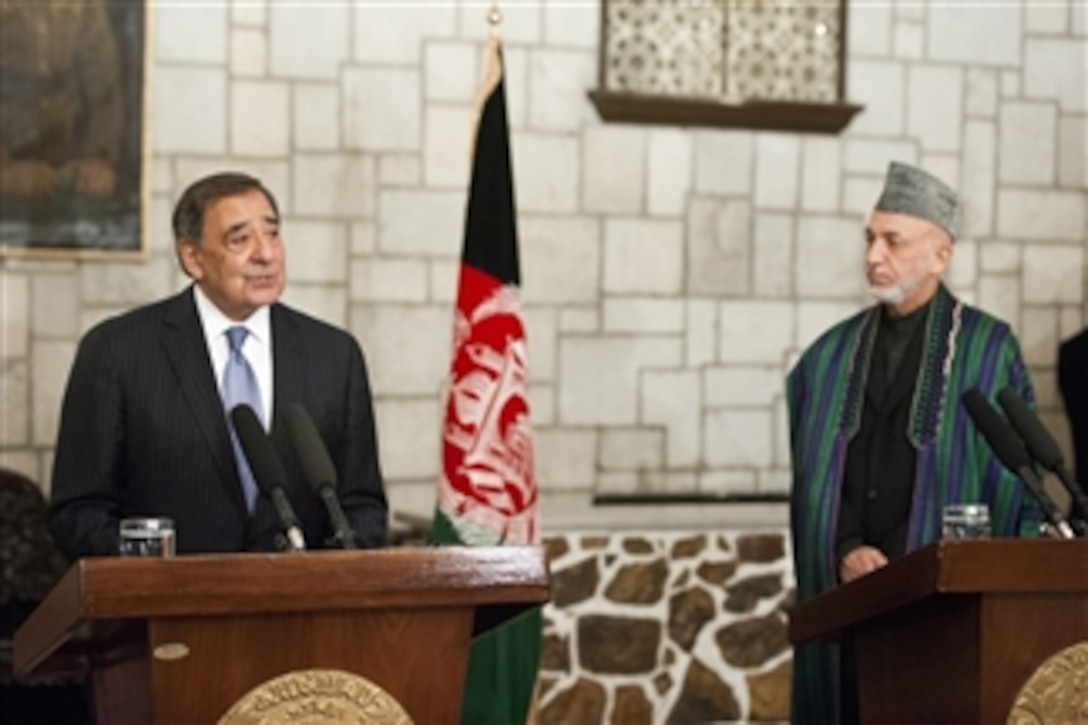 Secretary of Defense Leon E. Panetta, left, answers a reporter’s question during a joint press conference with Afghan President Hamid Karzai in Kabul, Afghanistan, on Dec. 13, 2012.  Panetta and Karzai met earlier to discuss regional security items of interest to both nations.  
