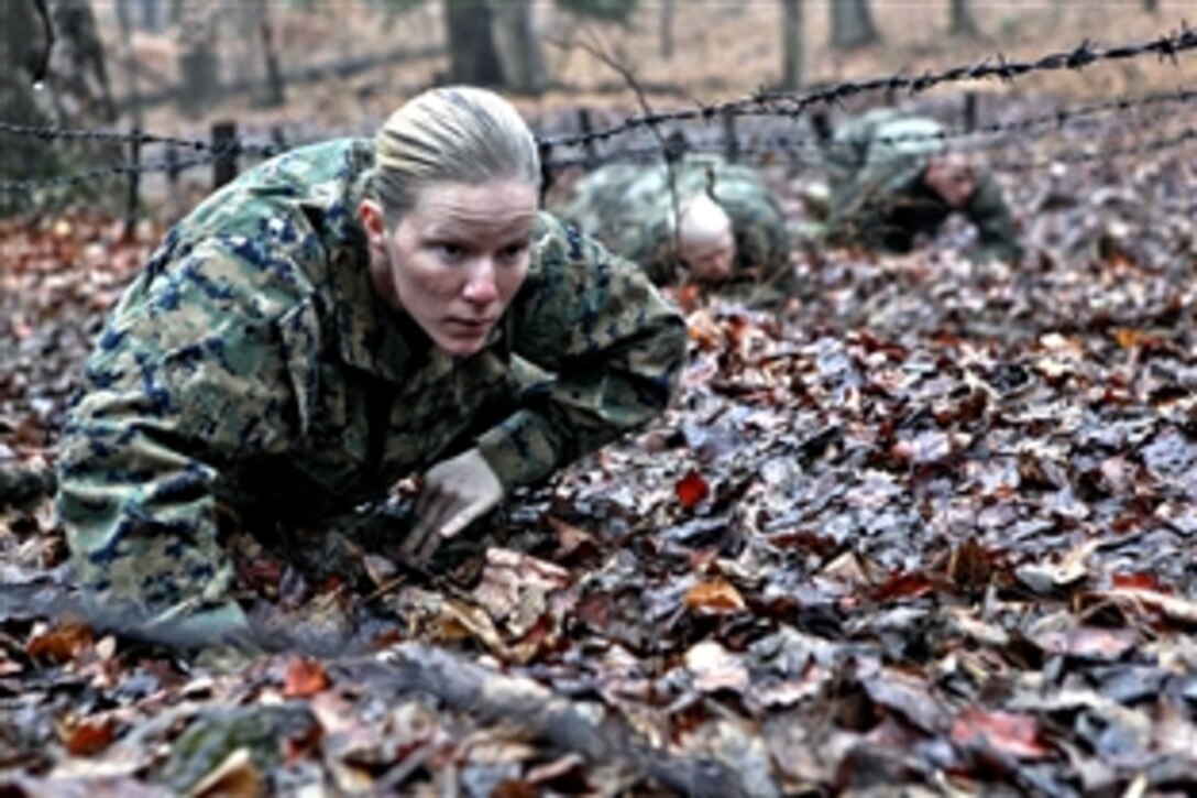 An officer candidate negotiates an obstacle course on Marine Corps Base Quantico, Va., Dec. 8, 2012. The course, known as the Montford Point Challenge, was designed in 2011 to give candidates a sense of the hardships the first African-Americans allowed to enlist in the Marine Corps faced.